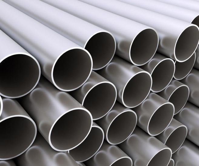 High quality render of stacked steel pipes close up